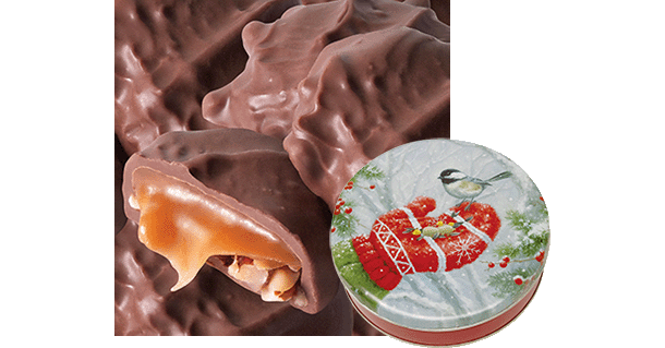 Textured chochlates with caramel and pecan center in holiday-themed tin