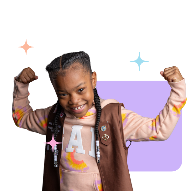 Girl Scout Making Muscle Pose