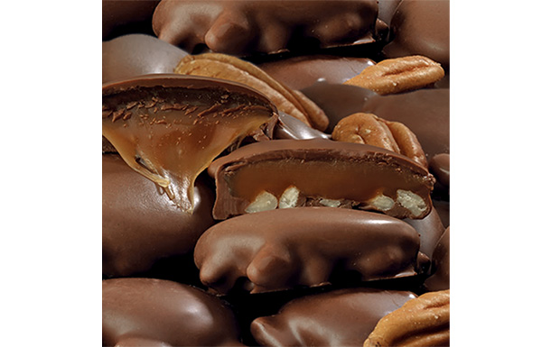 Textured chochlates with caramel and pecan center