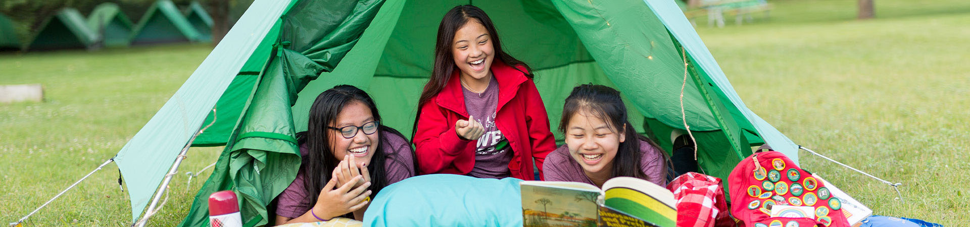  three girls sharing a tent 